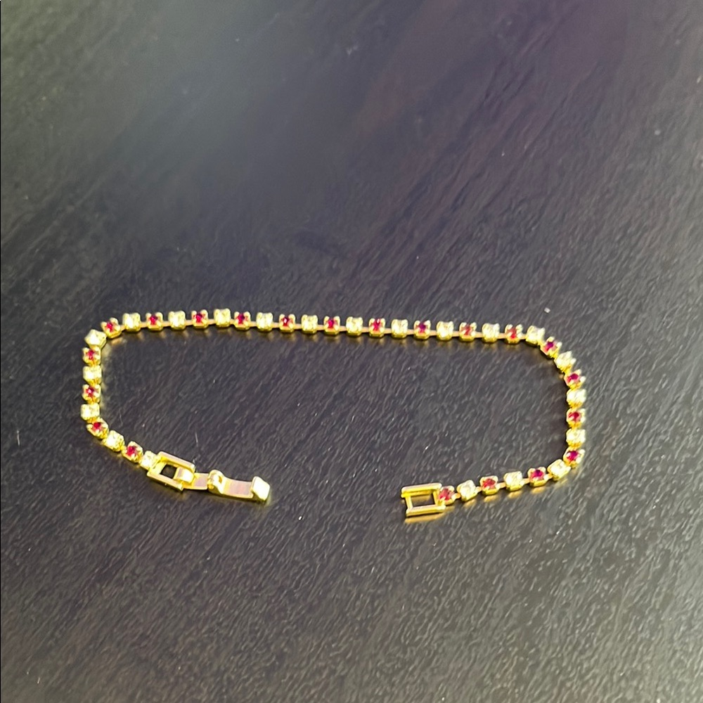 Elegant Gold and Red Bracelet